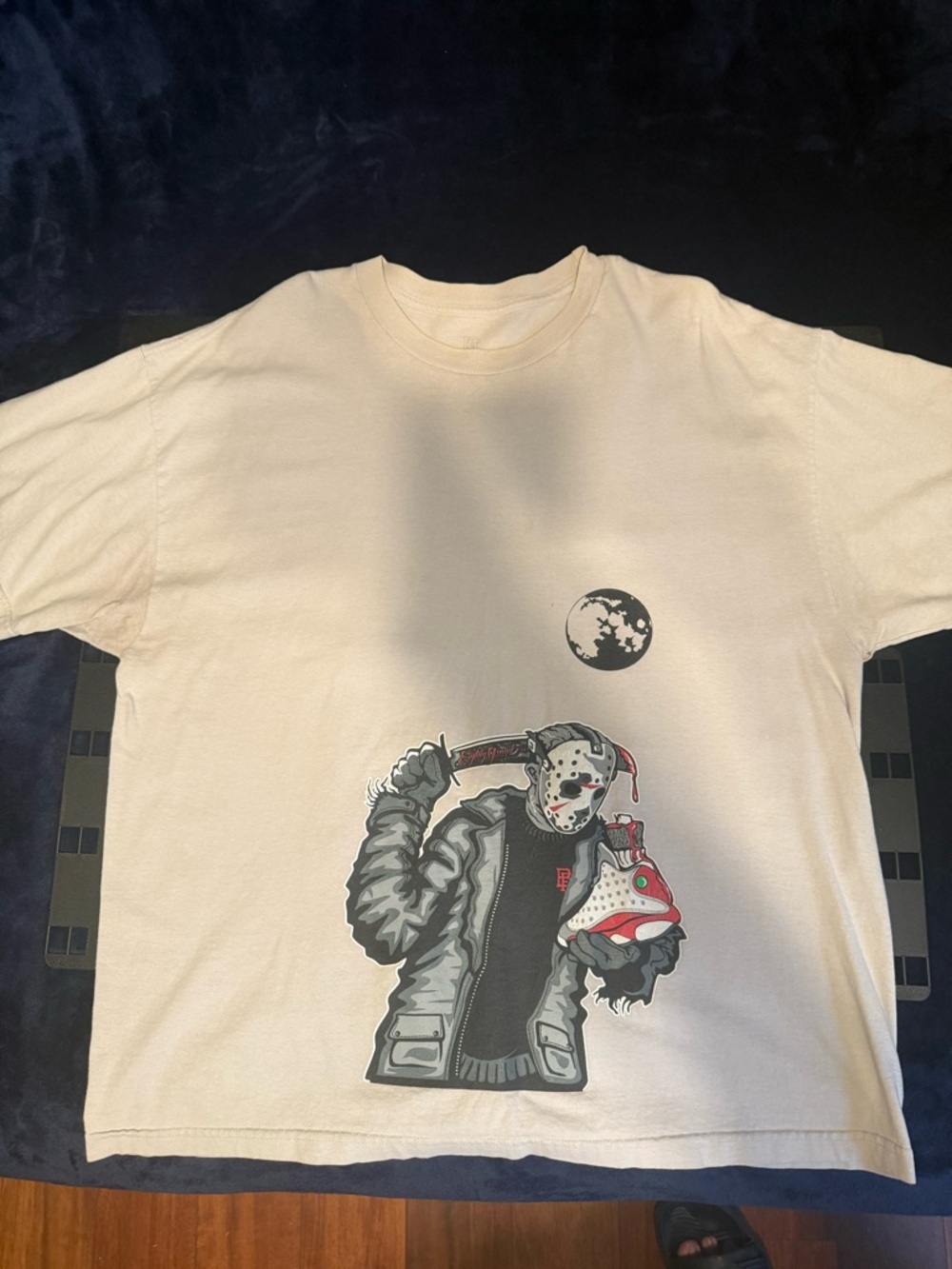 Cream Short-Sleeve Graphic Tee with Horror Mask Design